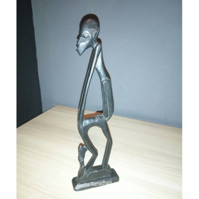 Patung Orang Dayak Erotis