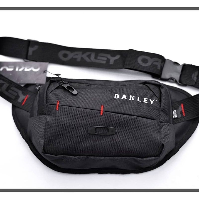 WAISTBAG OAKLEYY LOGO BESI TAS OAKLEYY TAS SELEMPANG OAKLEYY