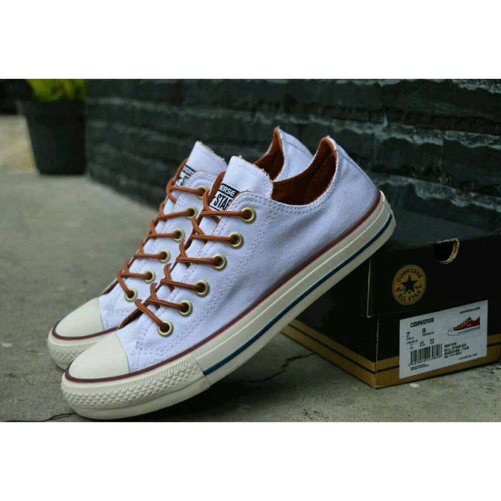 tan low top converse