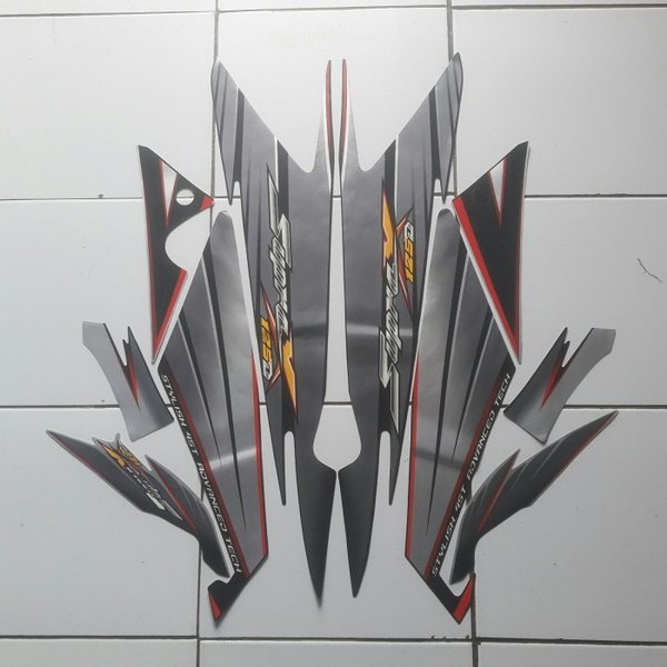 sticker striping body lis motor supra x 125d 2005 hitam-silver
