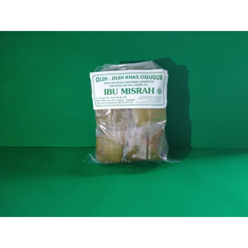 

Ibu Misrah Tape Ketan Bulat Hijau Asli Cigugur Bungkus Daun Jambu Kemasan Plastik Isi 10
