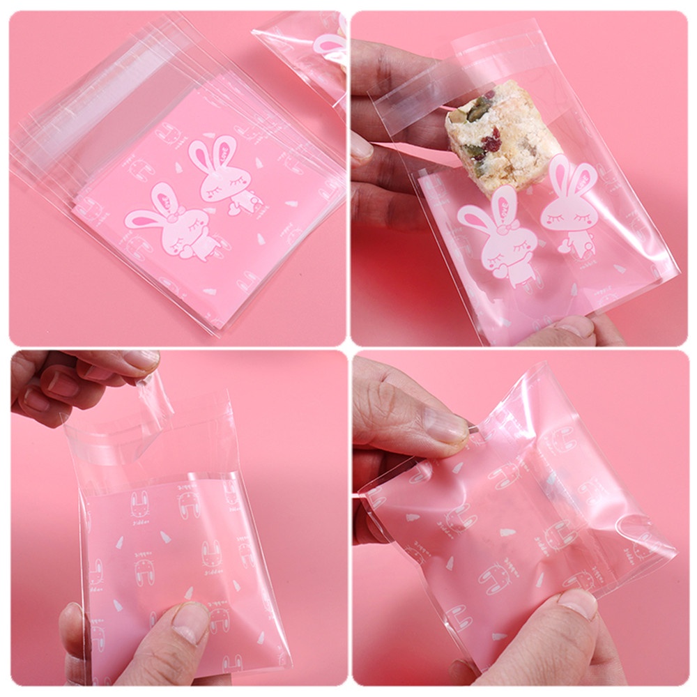 100pcs Kantong Plastik Ziplock Transparan Motif Kartun Lucu Untuk Permen / Kue / Biskuit