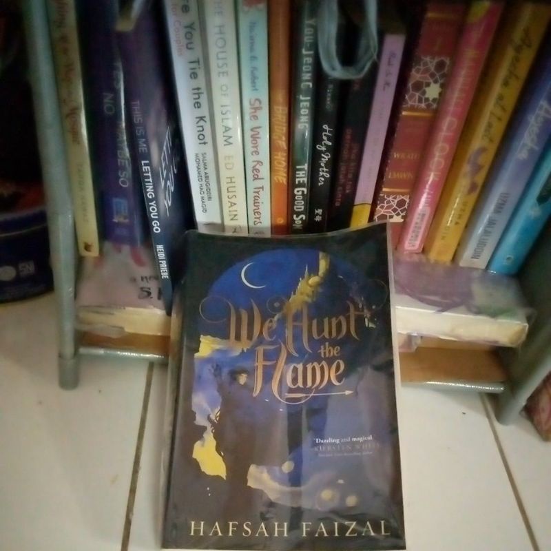 We Hunt The Flame (Preloved English Book) by Hafsah Faizal