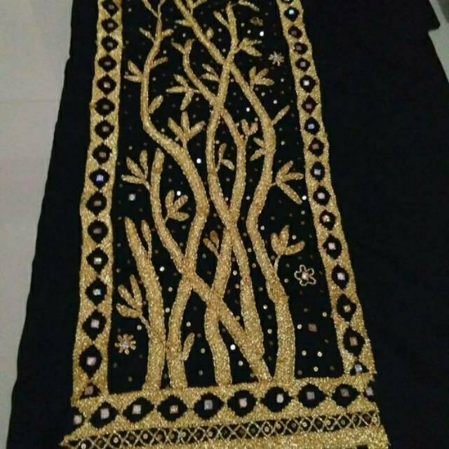 Rok tapis lampung