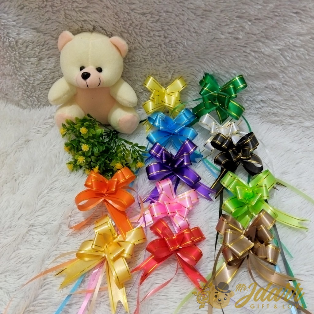 

Pita Tarik List Emas | Pita Metalik | Pita Serut Metalik | Pita Tarik Organdi | Hiasan Kado | 35CM