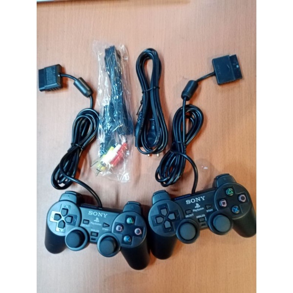 paket 2 pcs stick ps2 +kabel av rca +kabel listrik + MC