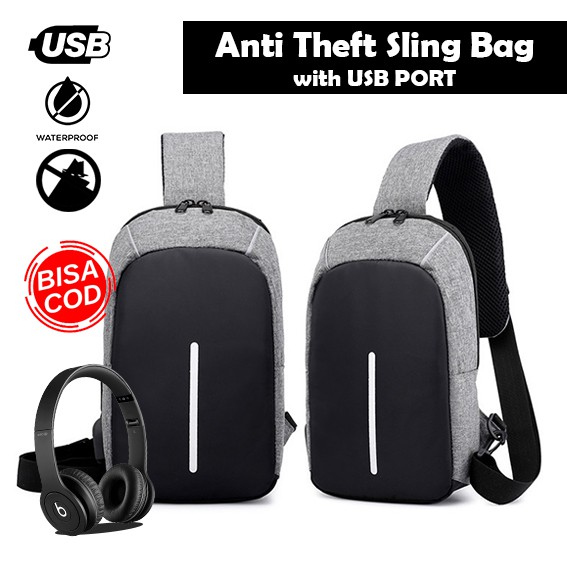 - BISA COD - USB Charger Tas Selempang Pria Sling Bag ANTI MALING Thief Fashion Sporty Travel Import