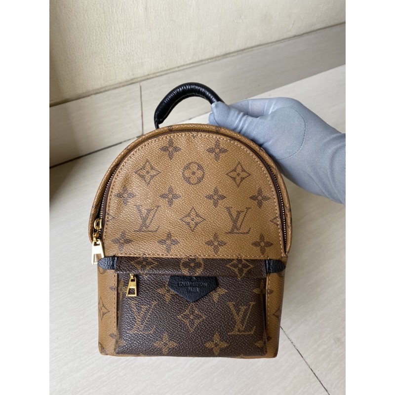 LV* palm spring mini backpack reverse monogram