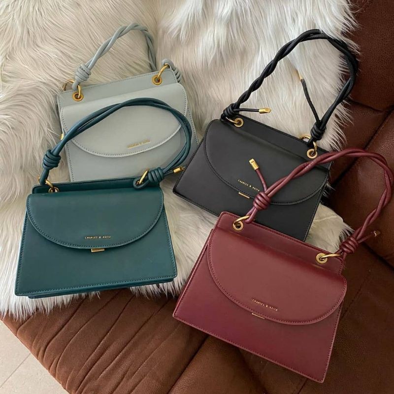 CK Twist Top Handle Front Flap Bag