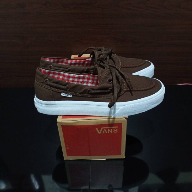 brown and white vans