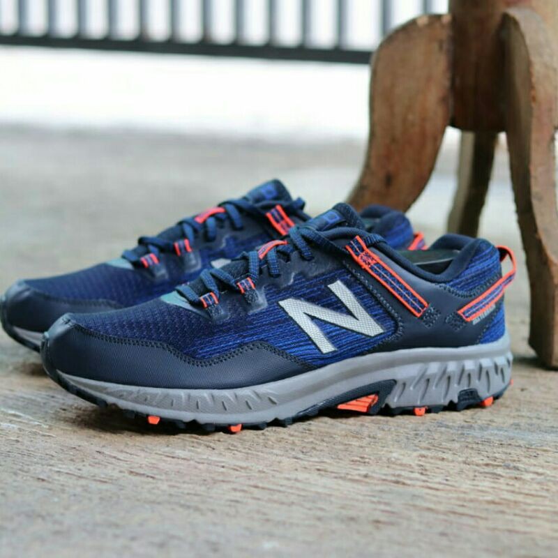 new balance 410 black orange