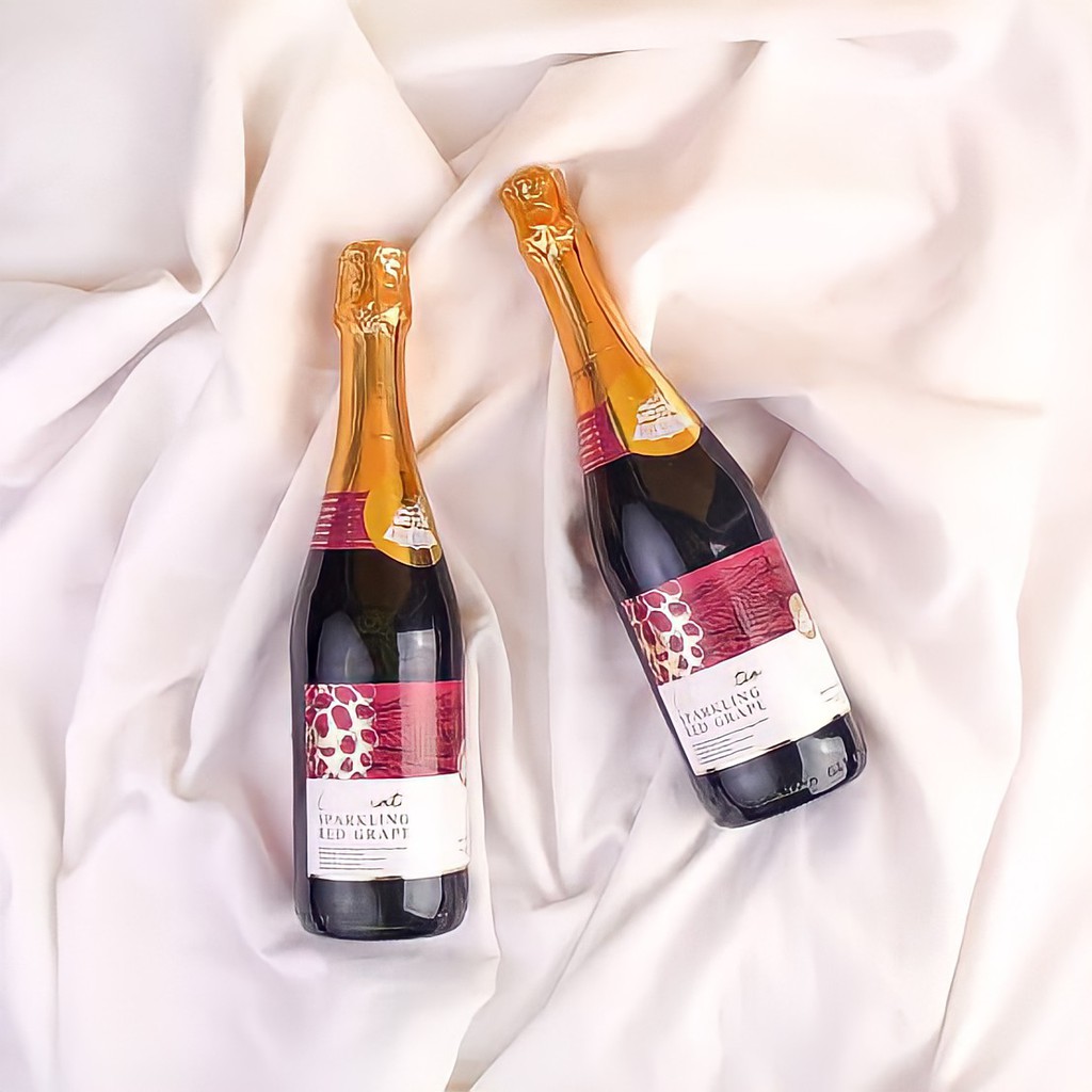 

STAR VILLAGE SPARKLING RED GRAPE JUICE / JUS ANGGUR SODA NON ALKOHOL