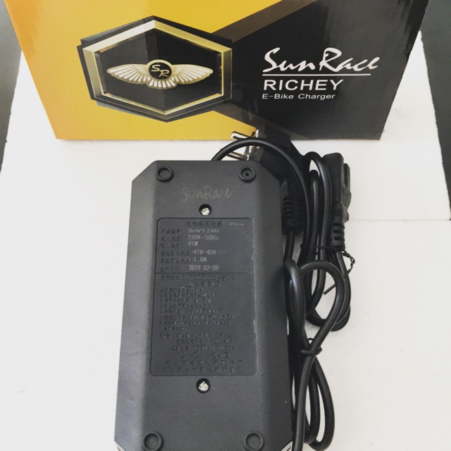 Charger sepeda listrik / electrik bike 36 volt atau scutter listrik bukan charger untuk HP