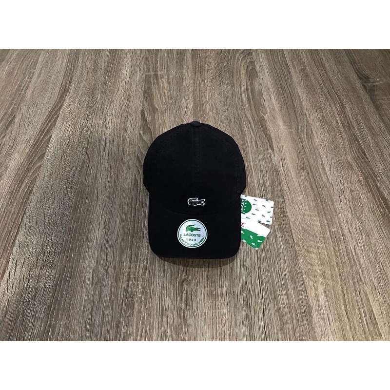 Topi Lacoste