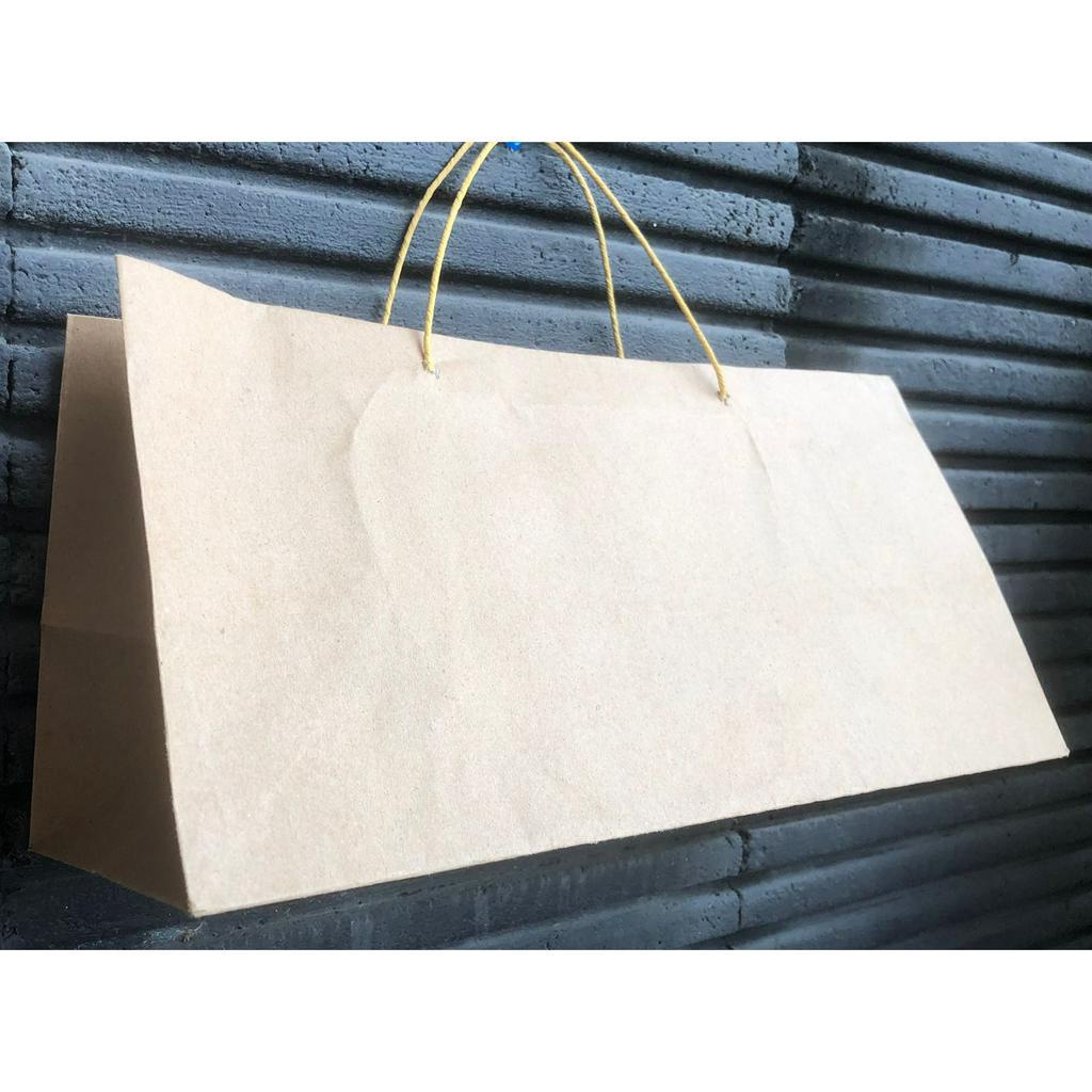 

Paperbag Tas Kertas Kraft Polos Goodie Bag 36 x 15 x 18 cm