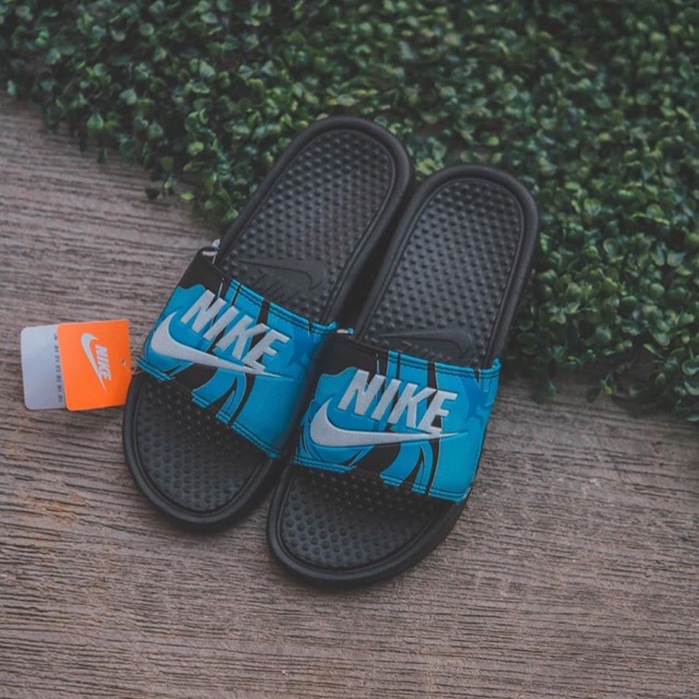 blue nike benassi slides