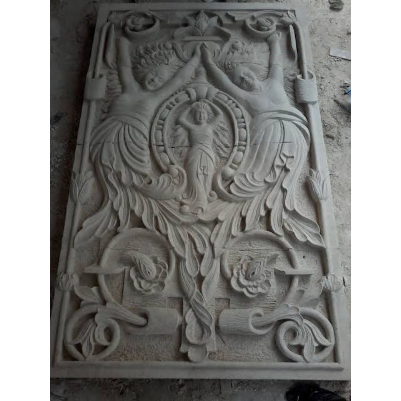 batu ukir relief hiasan dinding