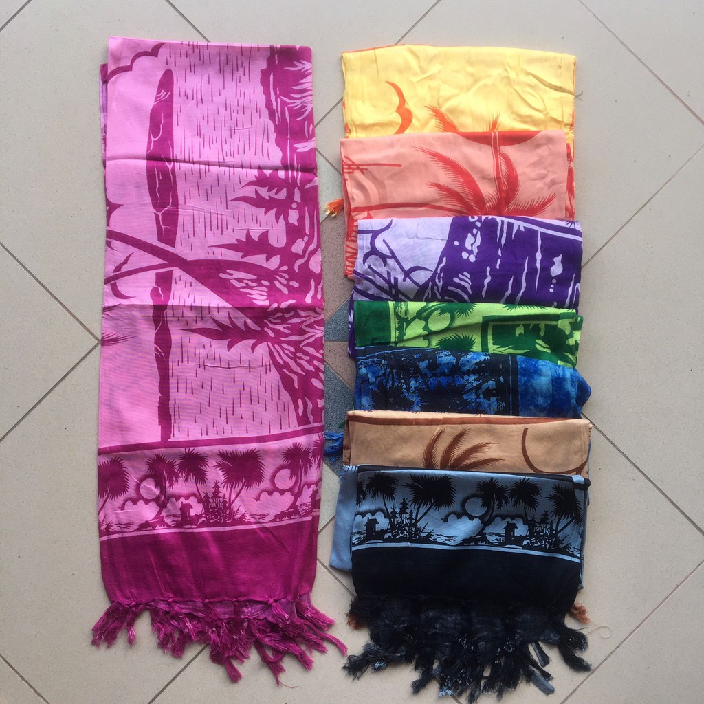 pakaian wanita kamen kain sarung pantai motif pemandangan bali oleh oleh khas bali souvenir bali