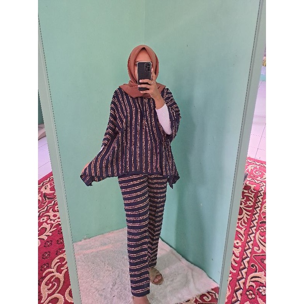 Setelan waka waka jumbo otina