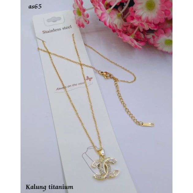 kalung liontin cnl titanium gold anti karat