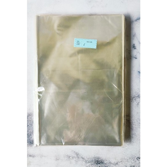 (100gr) PLASTIK OPP TEBAL TANPA LEM UNTUK BAJU PANJANG 40 CM PLASTIK OPP UNTUK BAJU