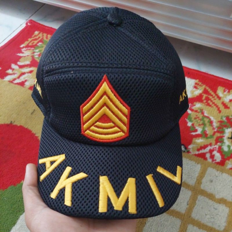 TOPI AKMIL