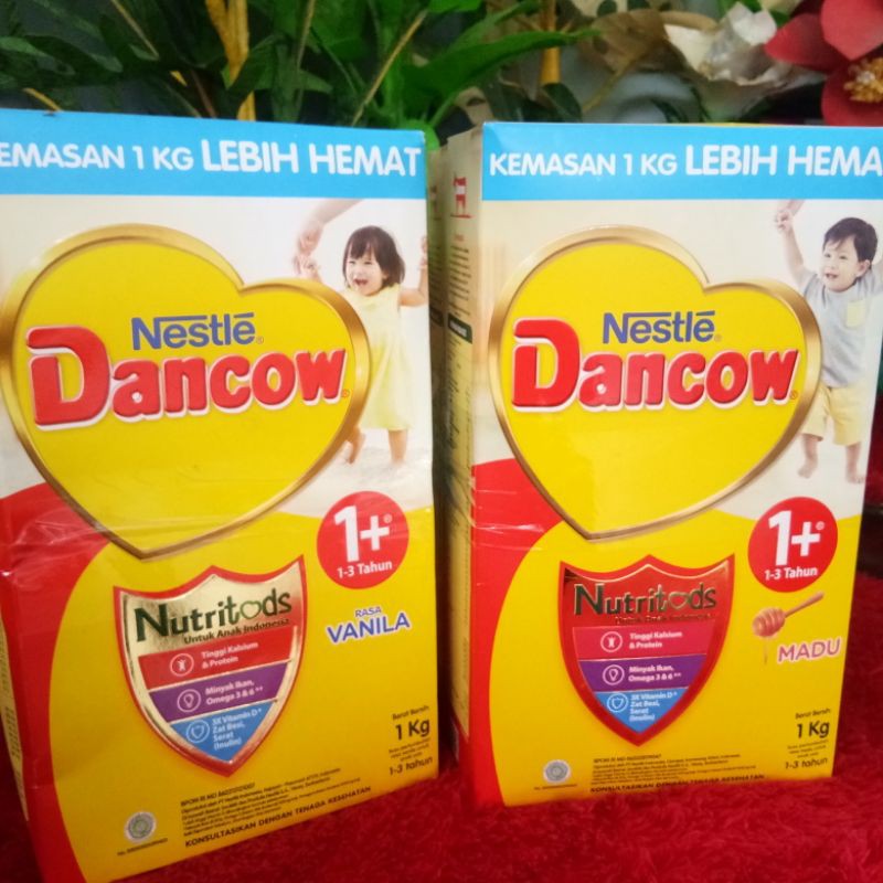 

Dancow 1+ ukuran 1kg/1000 gram rasa madu dan vanila