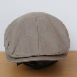 flat cap uniqlo