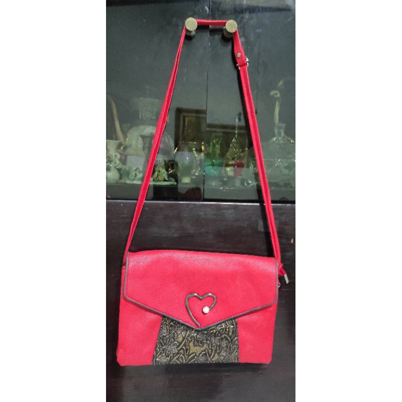 Tas sling tali kulit