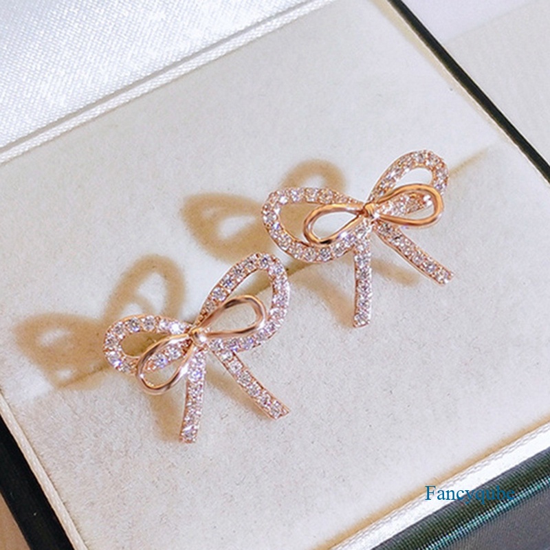 Fancyqube Anting Stud Kristal Cubic Zirconia Bentuk Pita Warna Emas Untuk Wanita