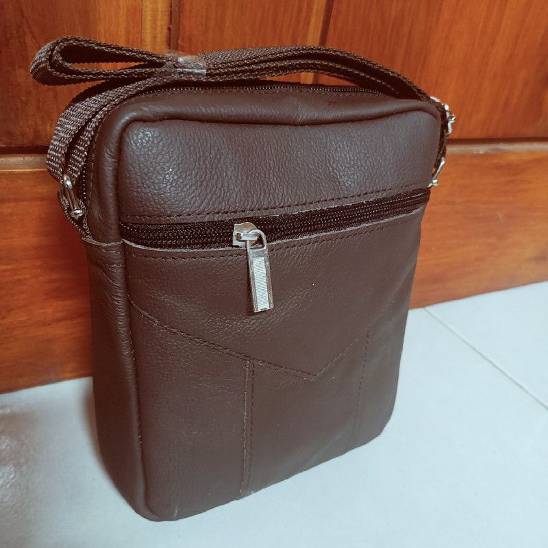 Tas kecil polos pria kulit asli mirah