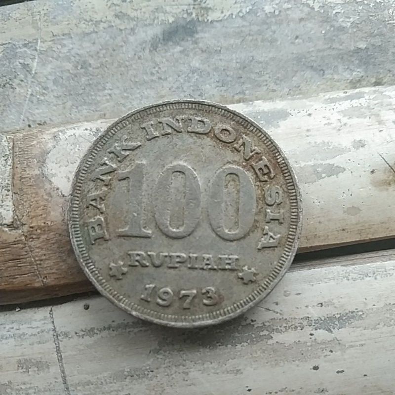 UANG 100RUPIAH KUNO TAHUN 1973 RUMAH GADANG (PUTIH)