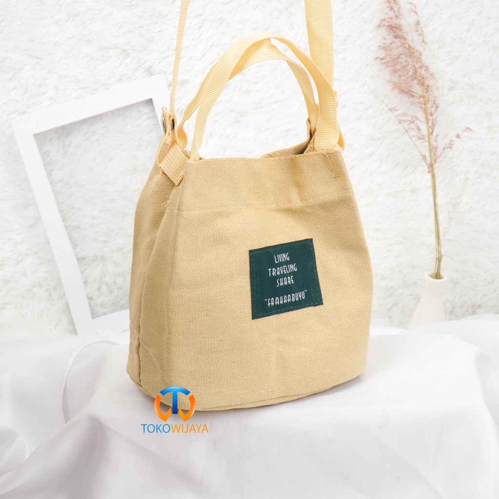 Tas Slempang Living Travel Import | Tote Bag