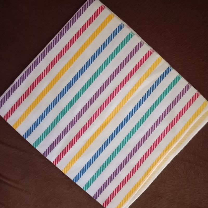 alas ompol kain lurik bayi