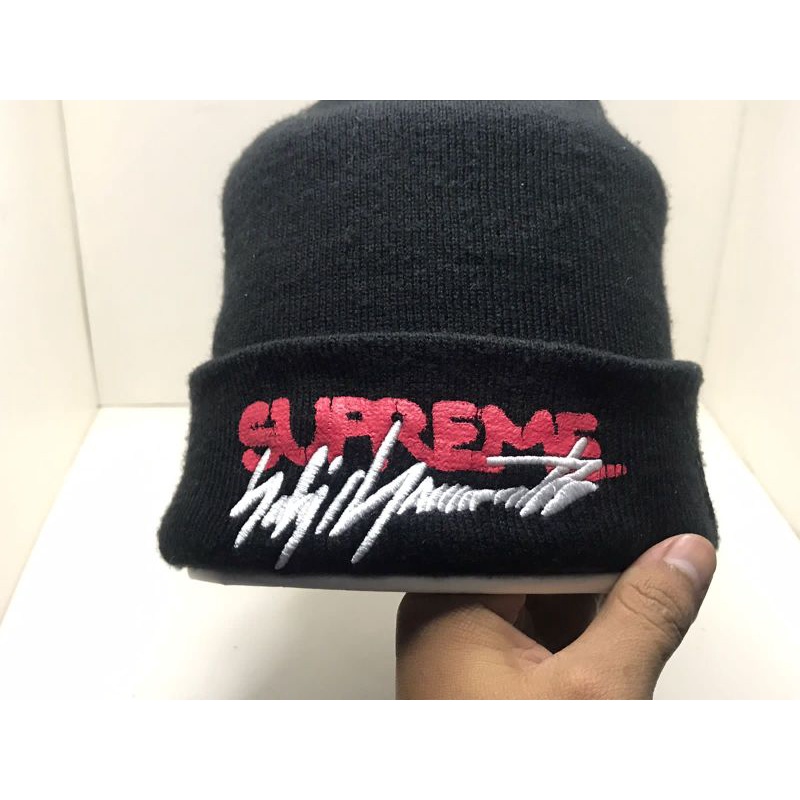 topi new era x supreme second original