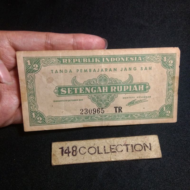 uangkuno 2,5 rupiah tahun 1945.noser 230965