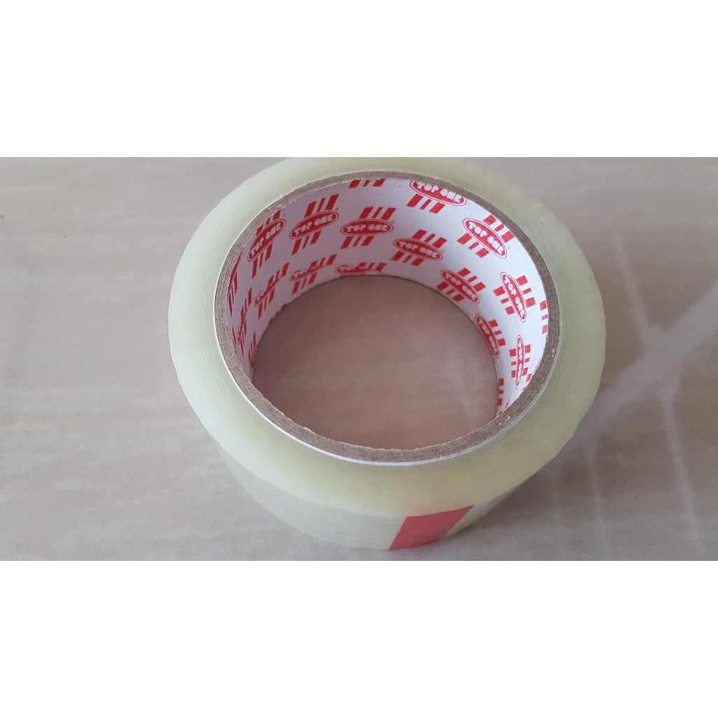 

Lakban/ Isolasi OPP Top One Merah (Pro Online Packing)