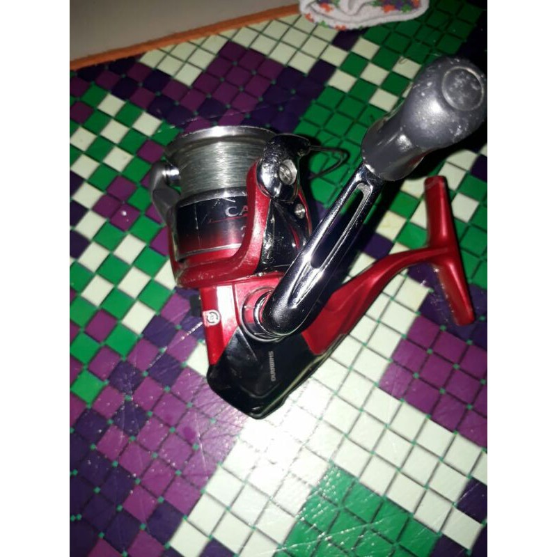 real atau gulungan pancing shimano