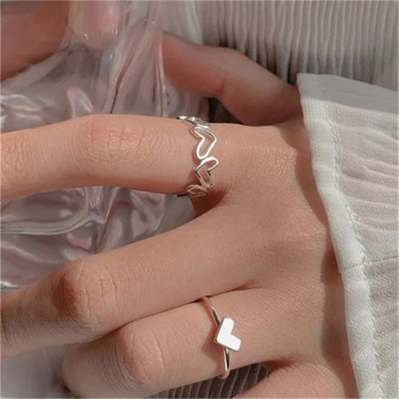 Cincin Model Terbuka Bahan Alloy Desain Hati Hollow Gaya Minimalis Adjustable Untuk Unisex