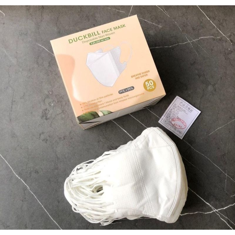 duckbill face mask YNB putih dan hitam