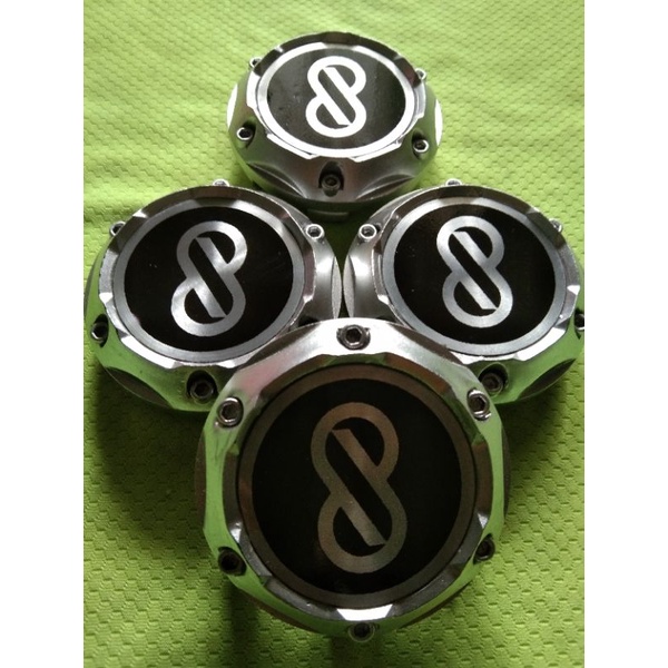 Dop center velg logo Enkei.Variasi cembung silver. Diameter 6,8 cm