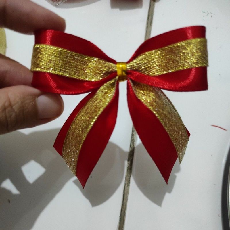 

Pita jadi Merah Gold /pita natal / pita kado souvenir hampers