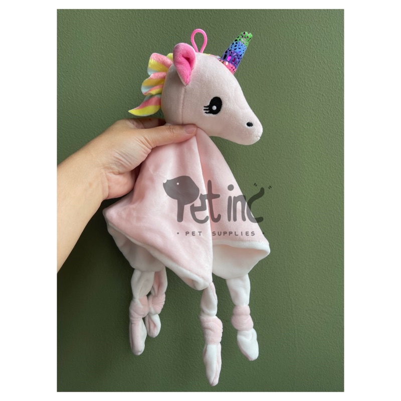 Premium napkin ringing toy unicorn