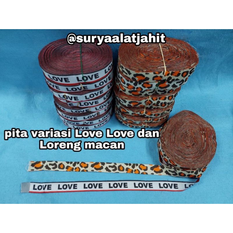 Pita Variasi Love Love dan Loreng Loreng macan uk.2.5cm polyester 1rol isi +/- 30 yard =rp.55.000/1rol