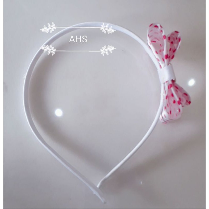 Bando pita kaku motif polkadot