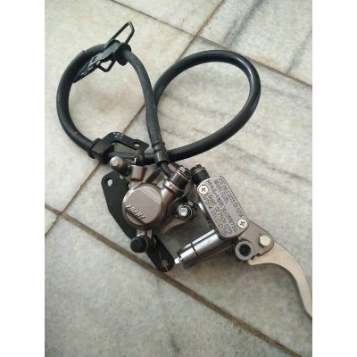 master kaliper assy scoopy f1 original nissin