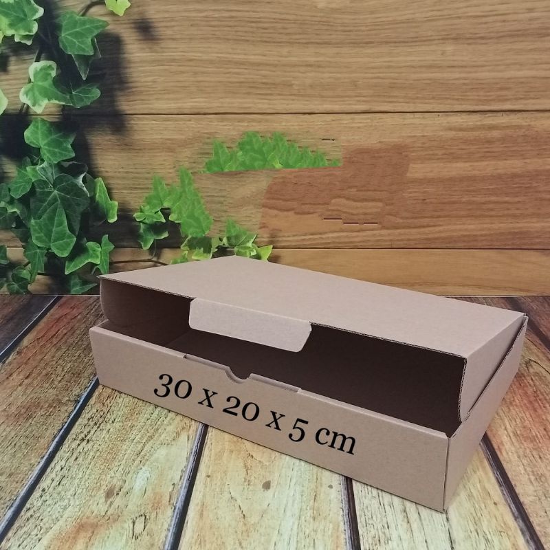 

kardus 30 x 20 x 5cm ..die cut