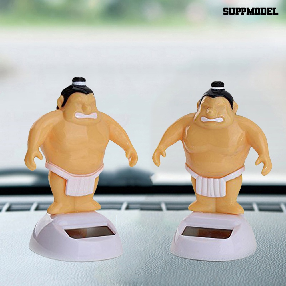 Ornamen model Sumo Lucu Tenaga Surya Untuk Dashboard Mobil