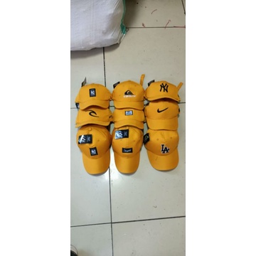 topi karakter kuning kunyit