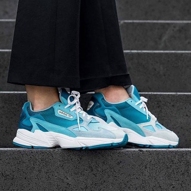 blue adidas falcon